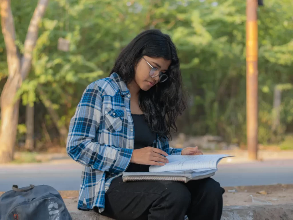 student reading her lesson